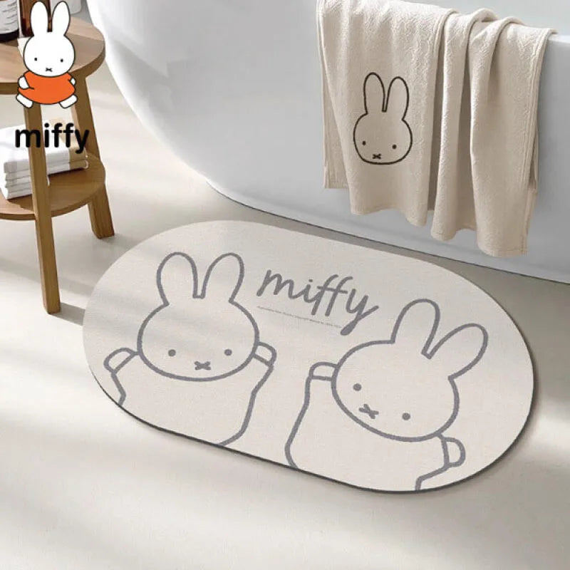 tapis bain dessin animé lapins gris jaune vert bleu rayures enfantin absorbant