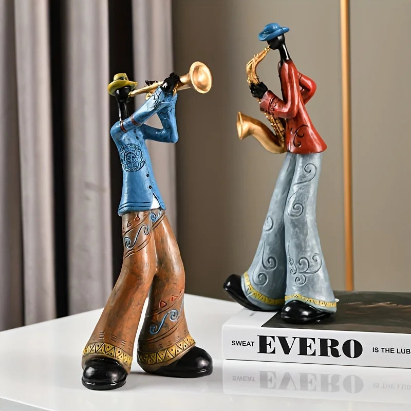 statues musiciens saxophone trompette ethniques motifs floraux bleu marron orange gris