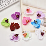 fleurs artificielles orchidées mix couleur decoration intérieure moderne minimaliste vert rose violet bleu blanc