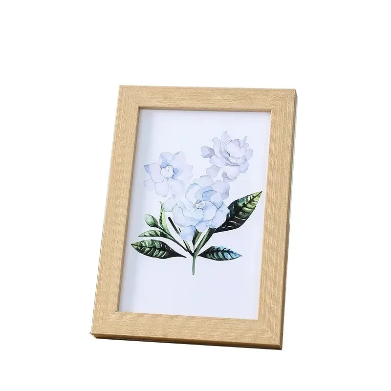 cadres photo bois clair marron blanc minimaliste motifs floraux supports mural poser triangles