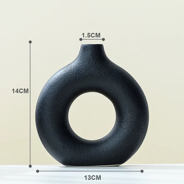 vases modernes roseclair beige noir bougies fleurssséchées décorationintérieure texturegrained minimaliste setdeco