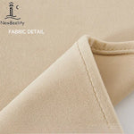 rideau classique bleu marine beige broderie dorée pompons salon maison luxe