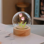veilleuse nuit tulipes rose pâle feuilles vertes base bois transparent moderne