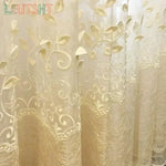 rideau brodé feuilles dorées fond beige transparent classique