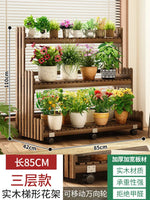 étagère bois moderne plantes intérieur extérieur balcon roulettes 110cm 140cm 42cm multiples niveaux contemporain