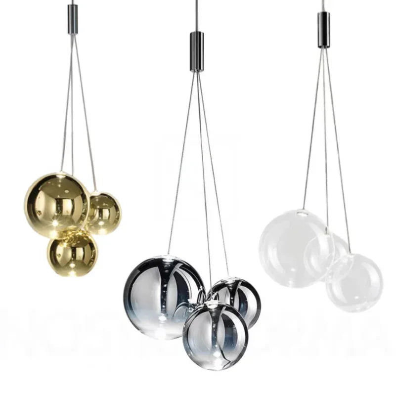 suspension lumineuse moderne sphères brillantes or argent transparentes chambre salle manger