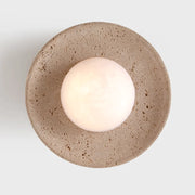 applique murale ronde pierre naturelle aspect granuleux minimaliste rustique éclairage led chambre salon