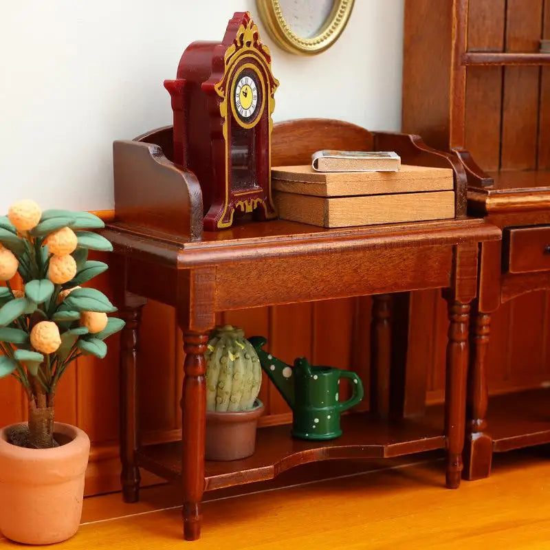 table toilette miniature meuble deco ancien horloge livres plante arrosoir fleurs cadre photo jouet