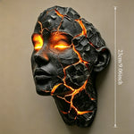 masque sculptural noir orange texture craquelée effet lave art contemporain sans fixation visible