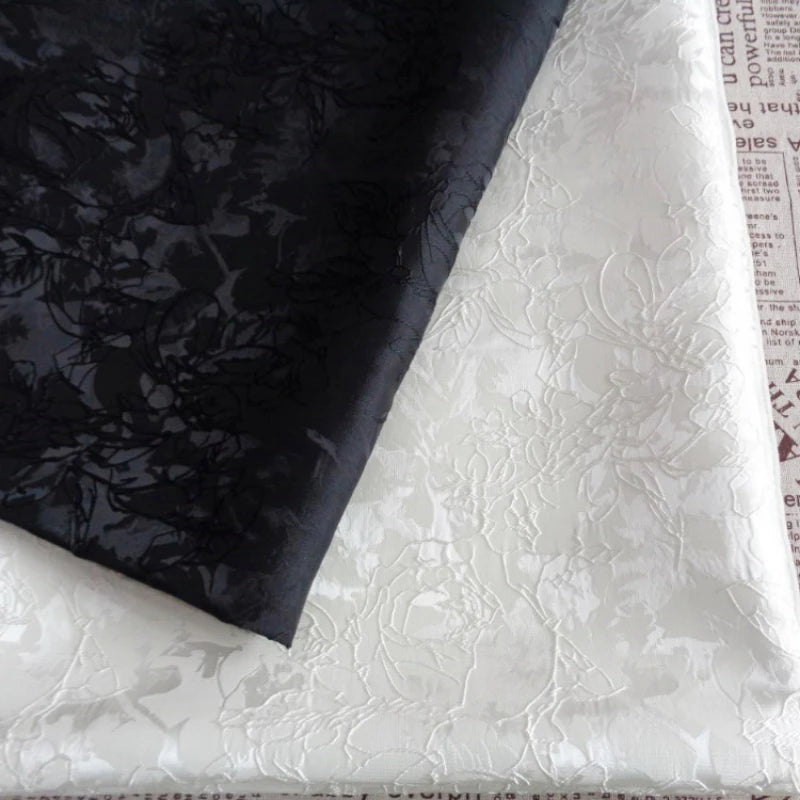 tissu brodé floral relief blanc noir résistant abrasion 145cm largeur tissu cérémonie simple