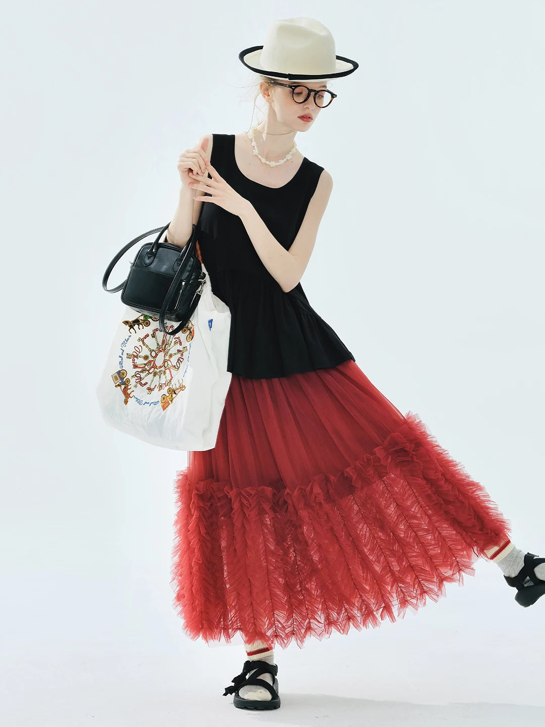 Jupe tulle rose clair élégante féminin ourlets franges translucide été femme