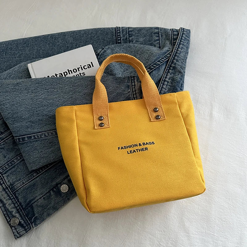 sac main toile polyester couleur rose rouge noir blanc jaune moderne casual poignées fermure