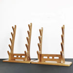 support épées bois moderne minimaliste noir brun clair katana sabres rack display salon