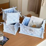 panier rangement tissu bleu clair rayures horizontales classique réutilisable rangement cosmétiques décoration