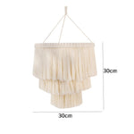 lampe suspendue boho macramé blanc cassé motifs géométriques boule bois franges decoration maison salon
