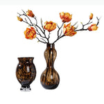 vases modernes translucides opaques motifs tourbillonnaires branches fleurs artificielles marron orange beige