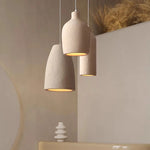 suspension lumineuse pendentif résine beige clair texture granuleuse moderne salon chambre principal