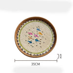 assiette plate décorative rotin tressé motif fleurs boho rustique couleur naturelle
