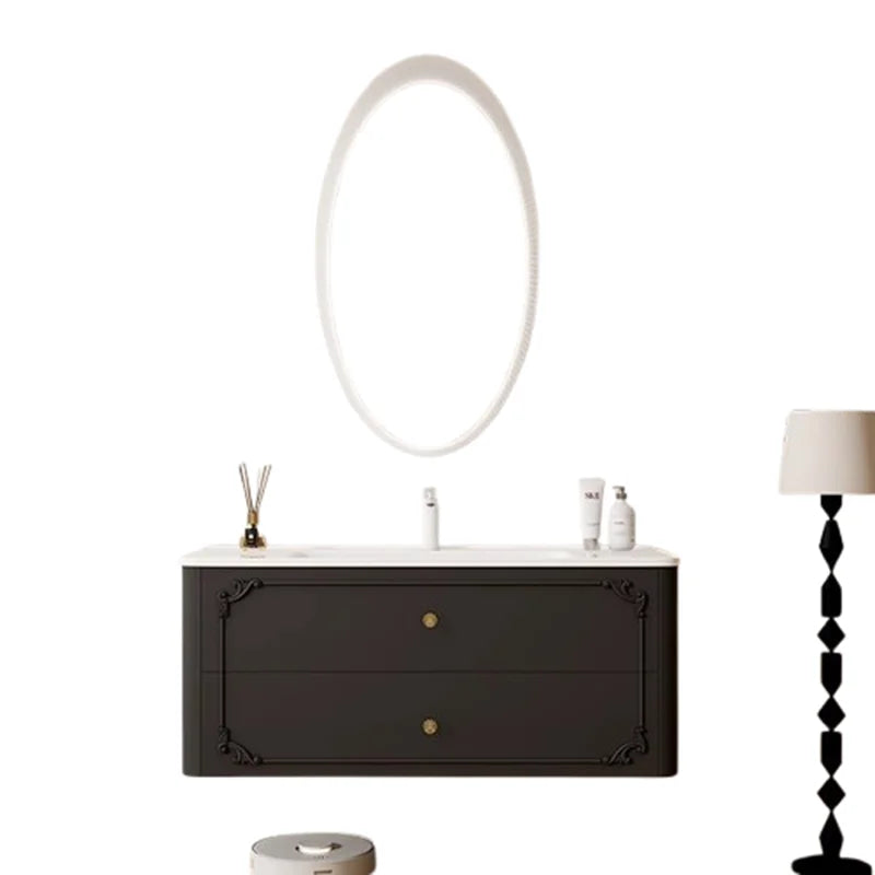 meuble salle bain noir blanc tiroirs vasque ornements dorés classique fixations murales accessoires cosmétiques