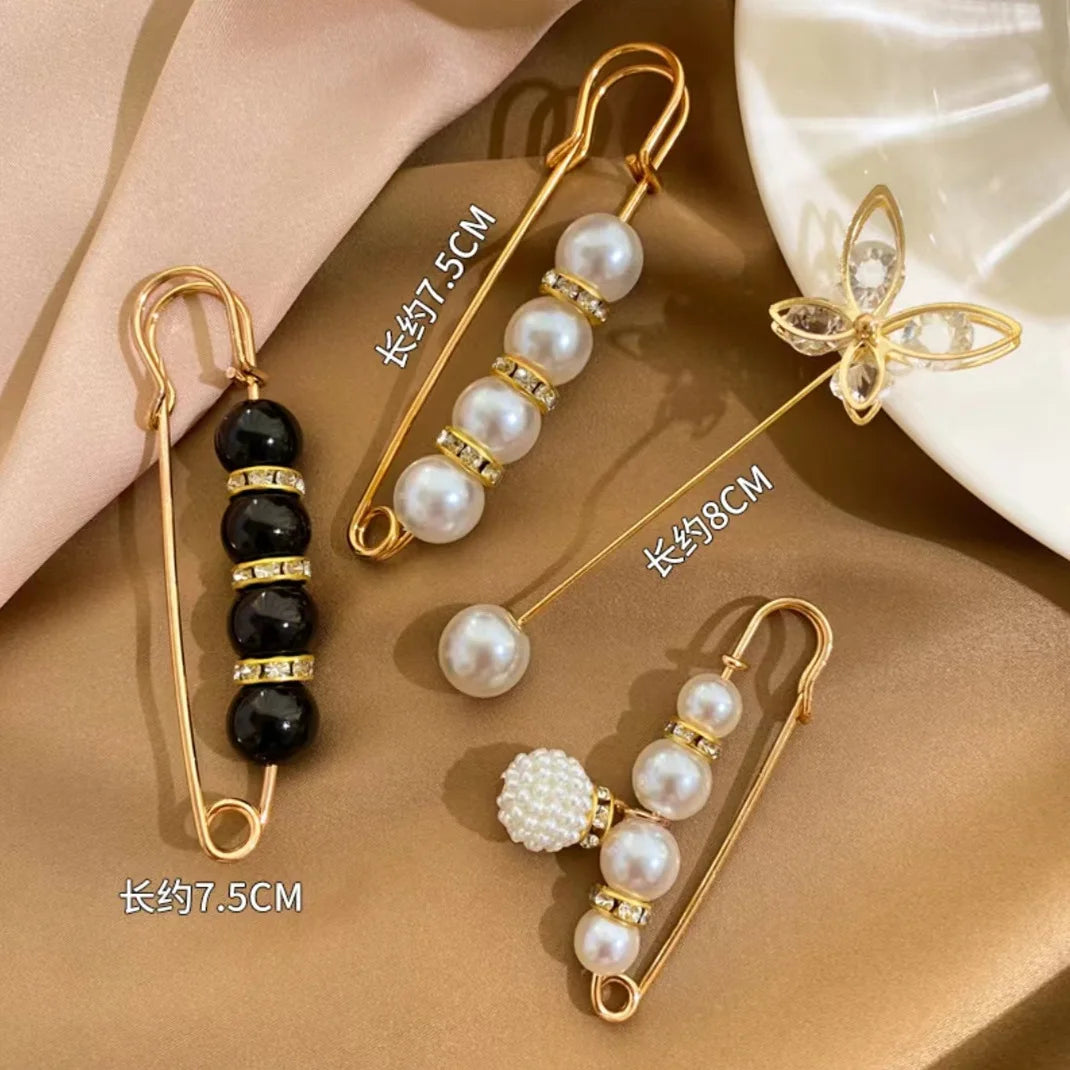 broches ornementales strass classiques élégantes clips or noires rouges