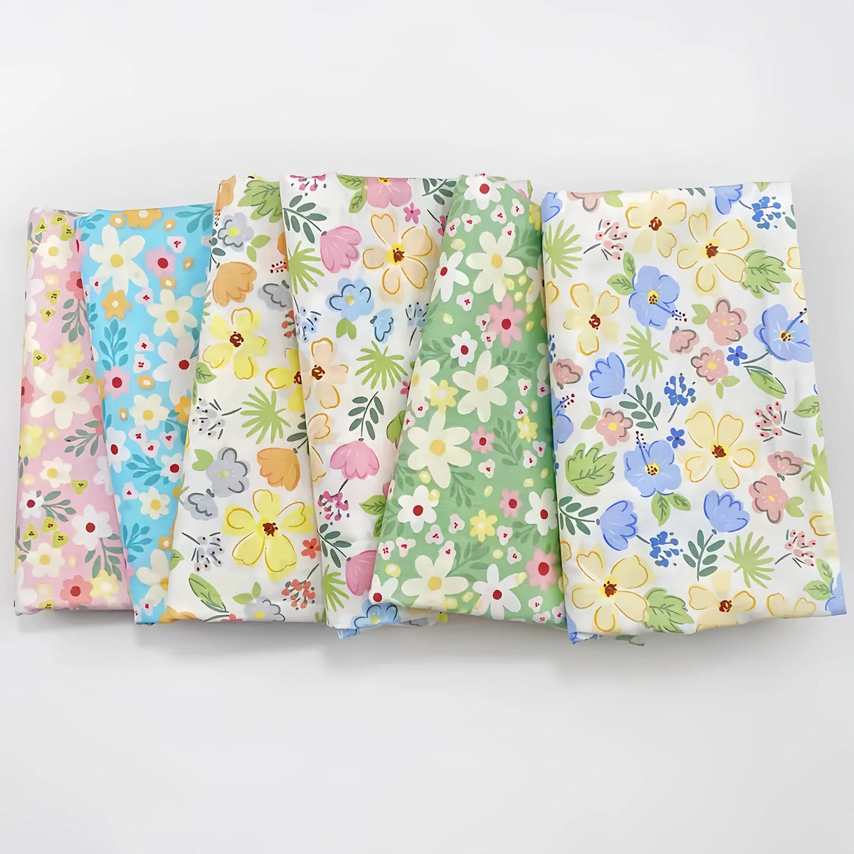 tissu floral patchwork six pièces motifs variés couleurs pastel champêtre doux