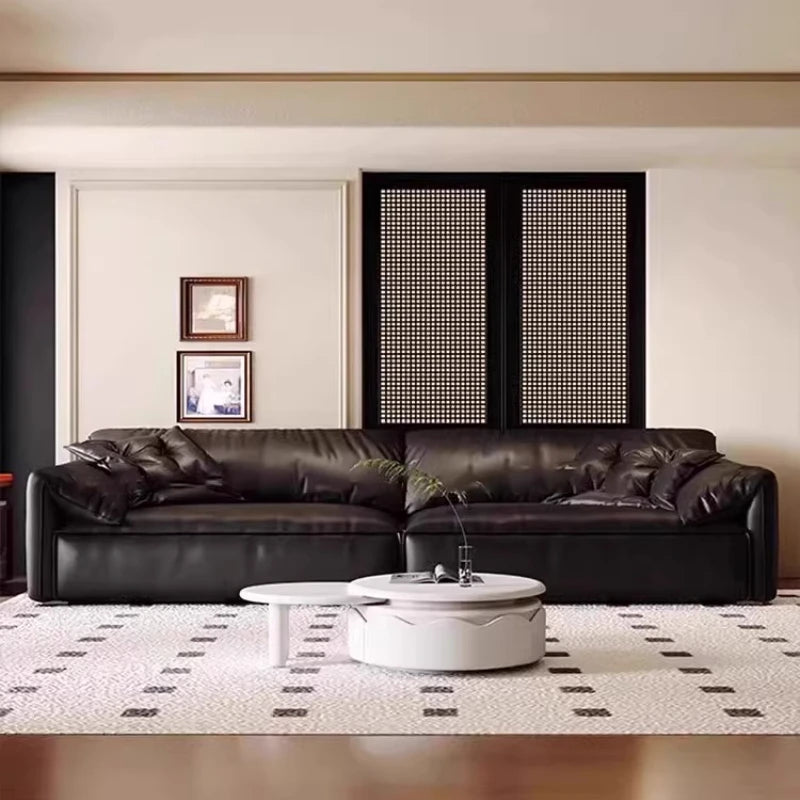 canapé d'angle contemporain noir texture cuir pieds carrés coussins dimensions variables jusqu'à 3.2m