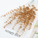 branche artificielle eucalyptus feuilles rondes vertes dorées décoration mariage centre table intérieur extérieur