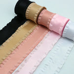 rubans satinés élégants motifs géométriques franges opaques noir beige roseclair