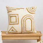 coussin décoratif moderne motif géométrique jaune gris beige texture bouclée canapé salon