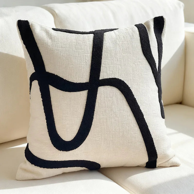 housse coussin décorative polyester coton blanc noir motif carreaux contemporain respectueux environnement maison hospitalière