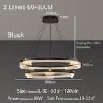 suspension lumineuse moderne noir doré ampoules led blanc translucide structure circulaire bandes translucides minimaliste