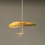 Suspension lumineuse moderne or texture feuille d'or câbles fins lumière chaude salon chambrehôtel