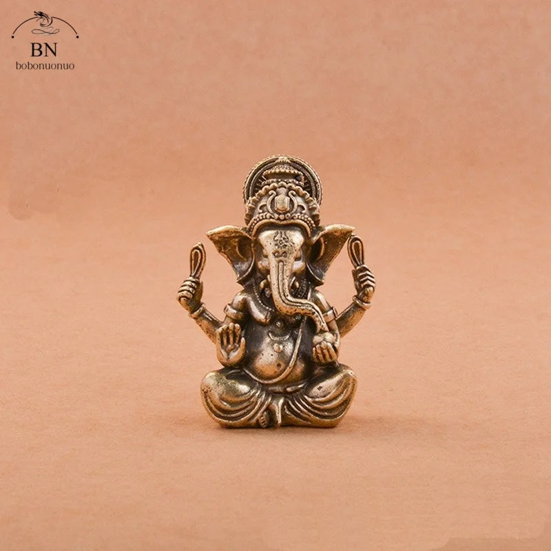 statuette ganesha bronze doré sculptée details complexes religieuse traditionnelle décoration intérieure éléphant dieuhindou ornement