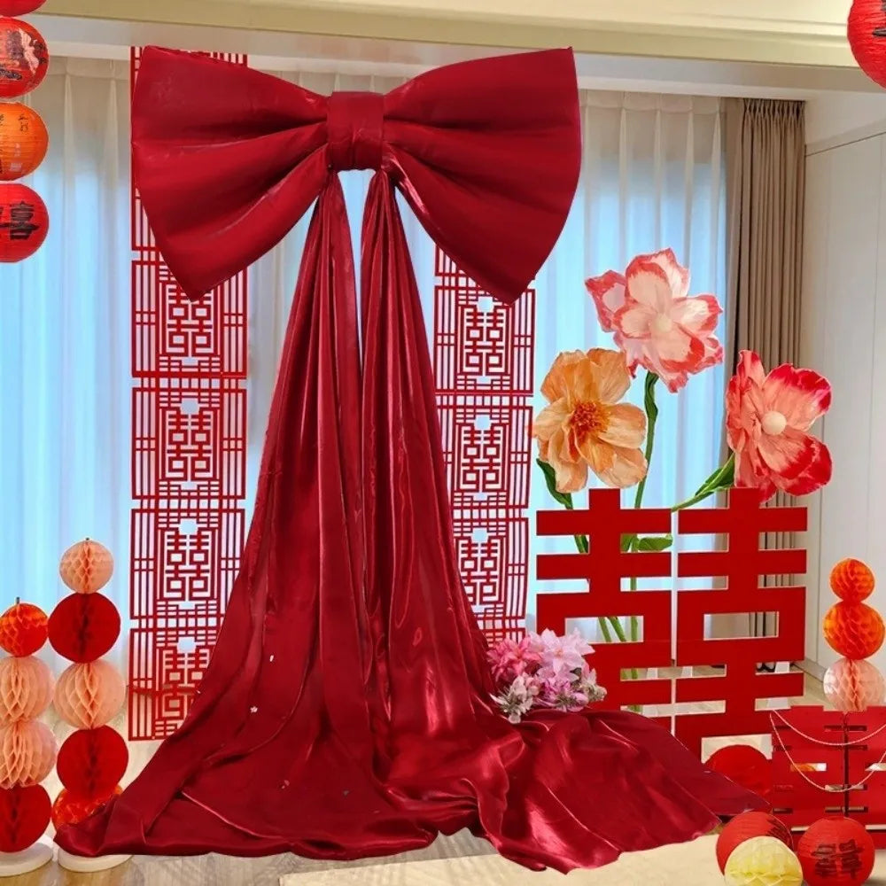ruban decoratif forme noeud sequins dorés argentés rose rouge nouvelle année fête grande dimension