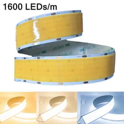 Ruban LED COB 24V ultra lumineux déroulé sur une surface blanche