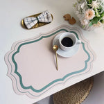 serviettes table moderne motif géométrique rose clair vert bleu beige ornementées