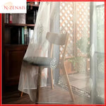 rideau tulle transparent blanc beige motif feuilles stylisées moderne salon chambre fenêtre maison