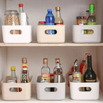 boîtes rangement moderne boîtes bacs plastique opaques couleurs variées beige blanc orange bleu sans