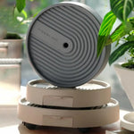 support plante roulettes collecte eau moderne gris clair rayures concentriquesversibleintérieur