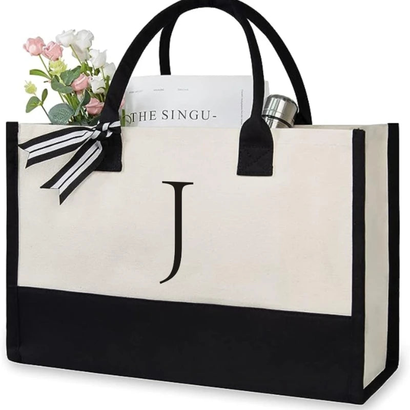 sac main toile lettre imprimée blanc noir rubans classique poignées intérieur noir zippé capacitaire