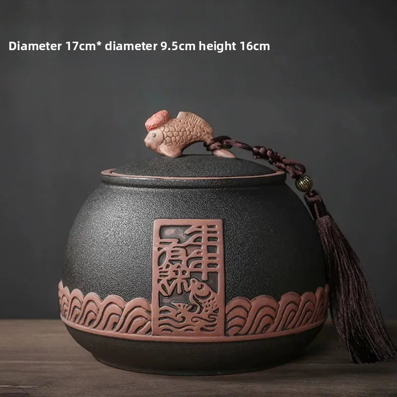 pot thé rouge jaune noir artisanal motifs floraux poisson chaîne pompon hermétique
