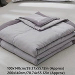 couverture rafraîchissante double face effet froid coton polyester portable moderne rose gris douce