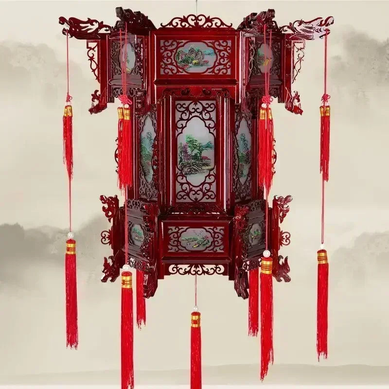 lanterne traditionnelle chinoise bois sculpté rouge décorative pompon fête mariage jardin