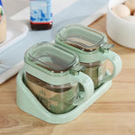 boîtes épices transparentes verre moderne rose verte bleu poignées couteau service herbes condiments cuisine