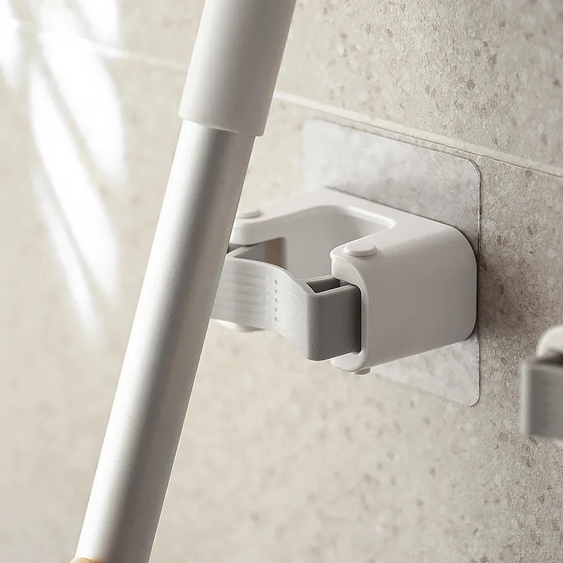 porte balai support mural rangement moderne outils nettoyage blanc gris bleu orange respectueux environnement
