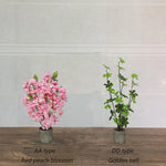 décoration intérieure plante artificielle fleurs feuilles moderne rose blanche verte salon