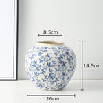 vase classique porcelaine fleurs blanc rouge bleu vert marron decoration table floral