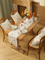 nappe table brodée motifs floraux rustique bohème couleurs chaudes herbes fleurs tissu texturé