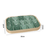 présentoir bijoux boîte velours vert clair moderne pochettes adhésives compartments dorés 30x20cm