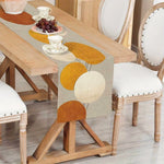 nappe table motif géométrique moderne beige orange blanc tissu lin facile nettoyage cuisine salle